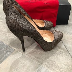 Hot Hot.... Christian Louboutin “python” pumps
